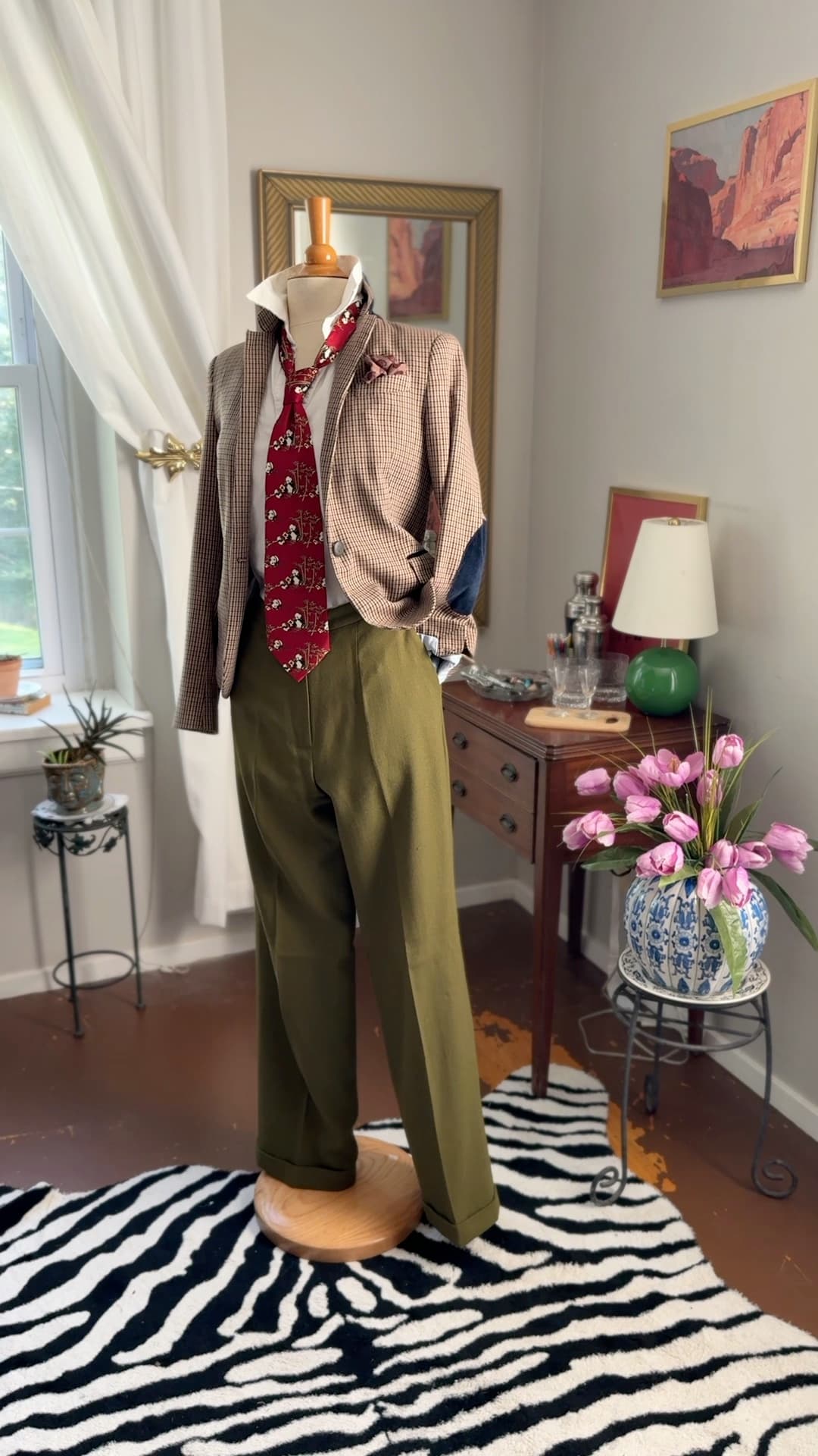 Vintage Giorgio Armani Cravatte tie in lacquer red, printed with pandas in a bamboo grove, styled over a white shirt and houndstooth jacket.