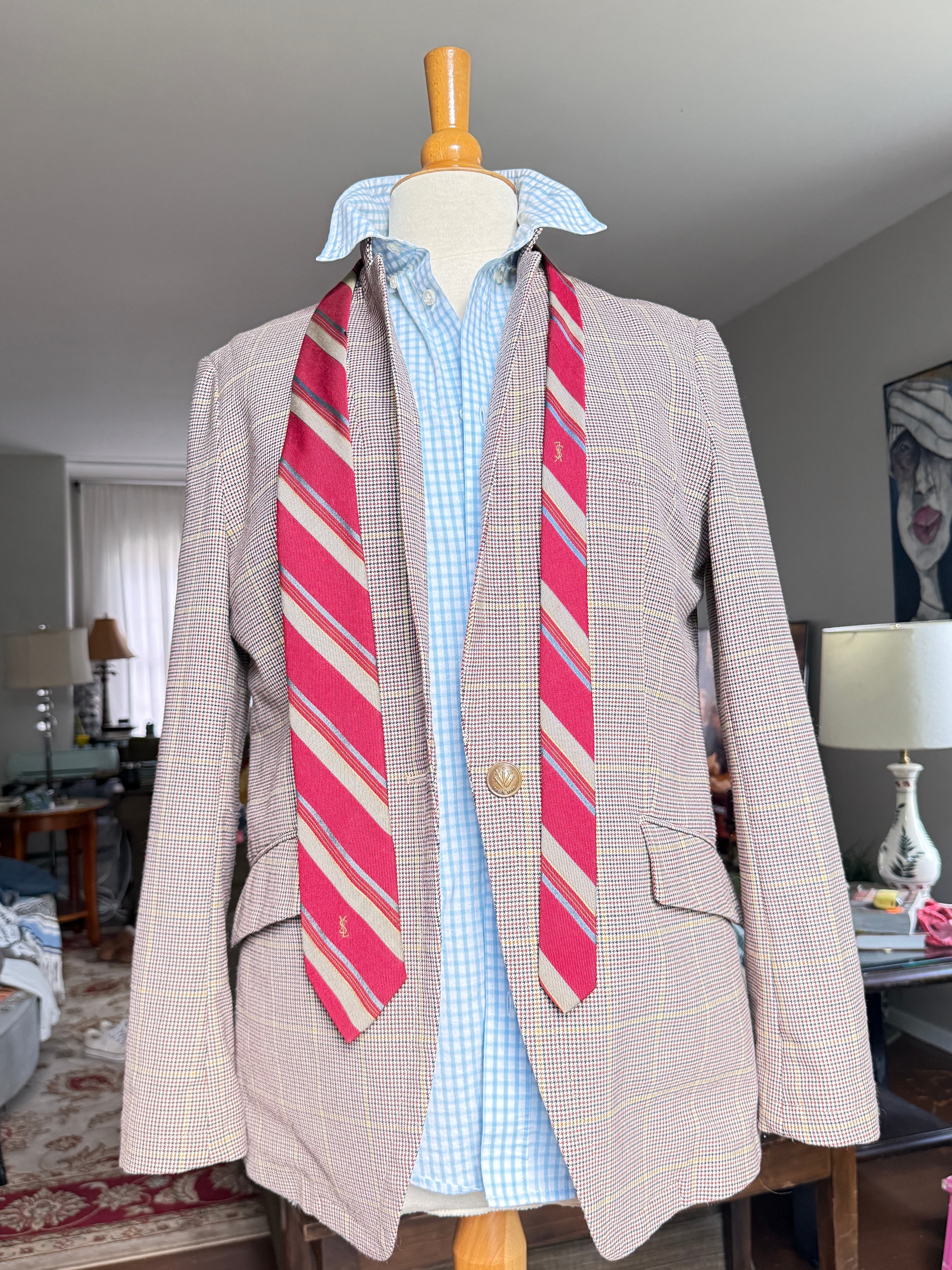 Vintage Yves Saint Laurent crimson repp-stripe tie with sand and sky-blue diagonal stripes, styled over a blue gingham shirt and houndstooth jacket.