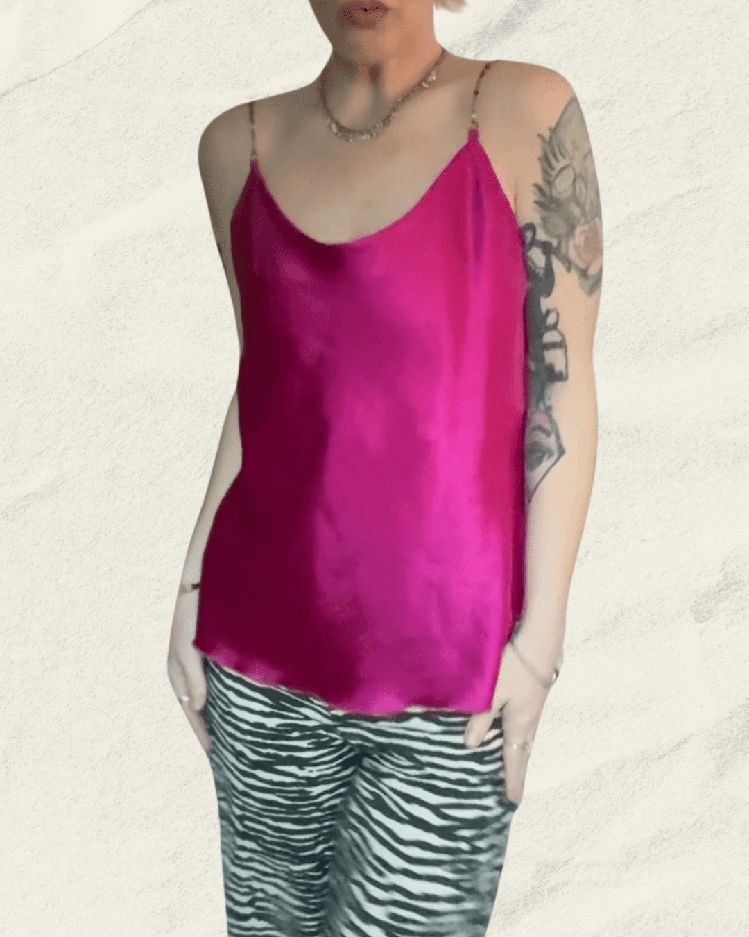 Y2K fuchsia Nicole Miller bias-cut silk camisole with multicolor hand-beaded straps and a draped neckline, shown flat.