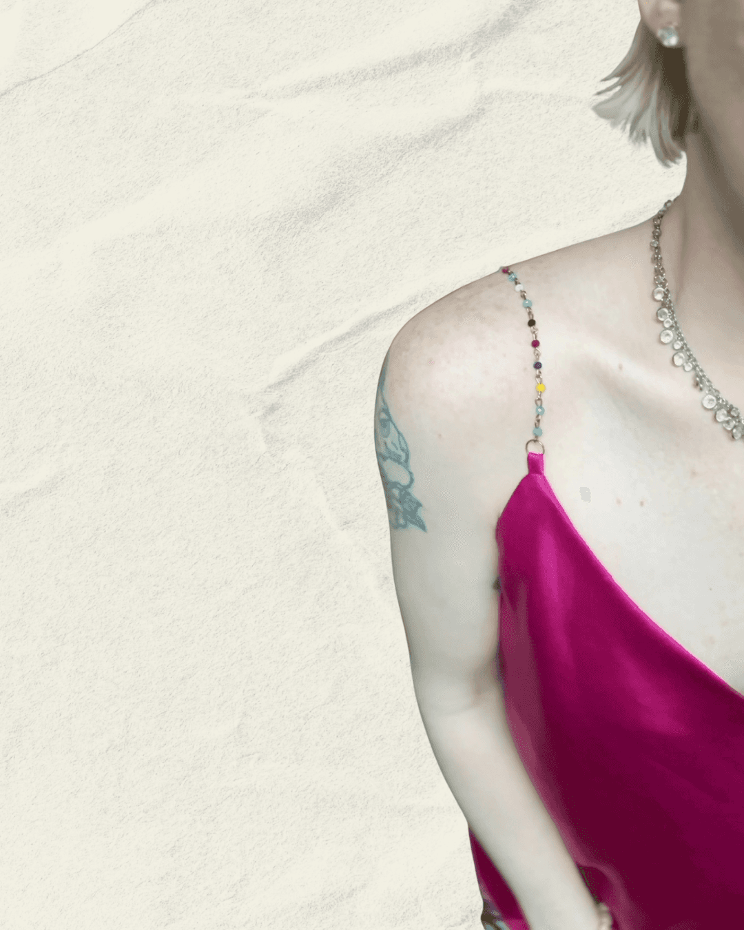 Y2K fuchsia Nicole Miller bias-cut silk camisole with multicolor hand-beaded straps and a draped neckline, shown flat.