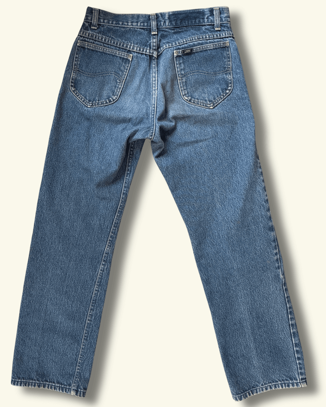 Paint-marked vintage Lee Riders medium-wash straight-leg jeans, model 200-0147, tagged 30 x 34