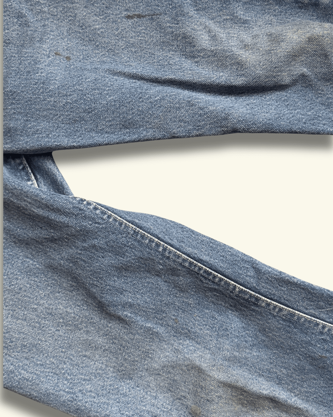 Paint-marked vintage Lee Riders medium-wash straight-leg jeans, model 200-0147, tagged 30 x 34